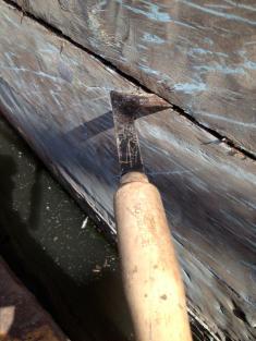 A reefing tool, used to pull old caulking out so that it can be replaced with fresh.